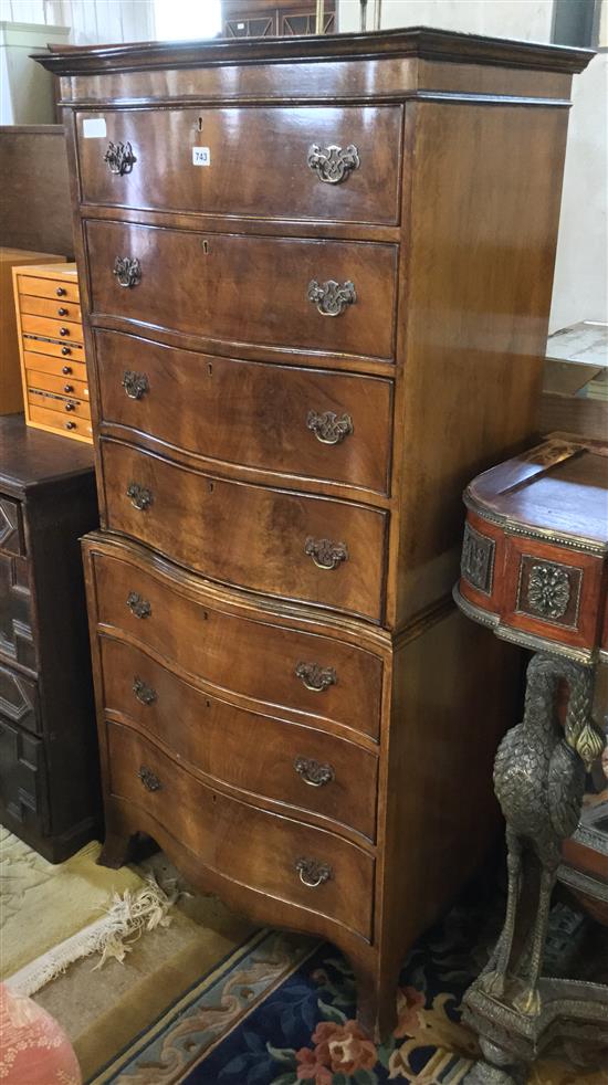 Serpentine front mahogany tallboy